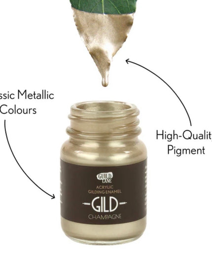 Bottle of GILD acrylic gilding enamel with a droplet of metallic color above it on a white background.
